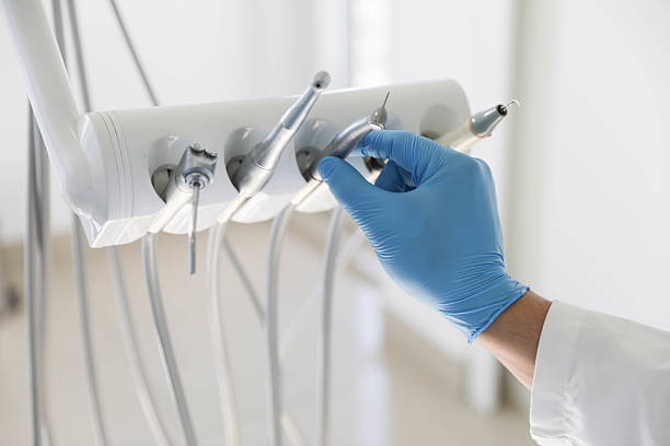 Professional Tooth Extraction technician working in White Plains, NC